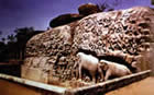 Relief sculpture with figures and animals in granite