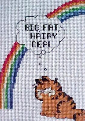 photo of Garfield (needlepoint by Sue) saying that rainbow is big, fat, hairy deal